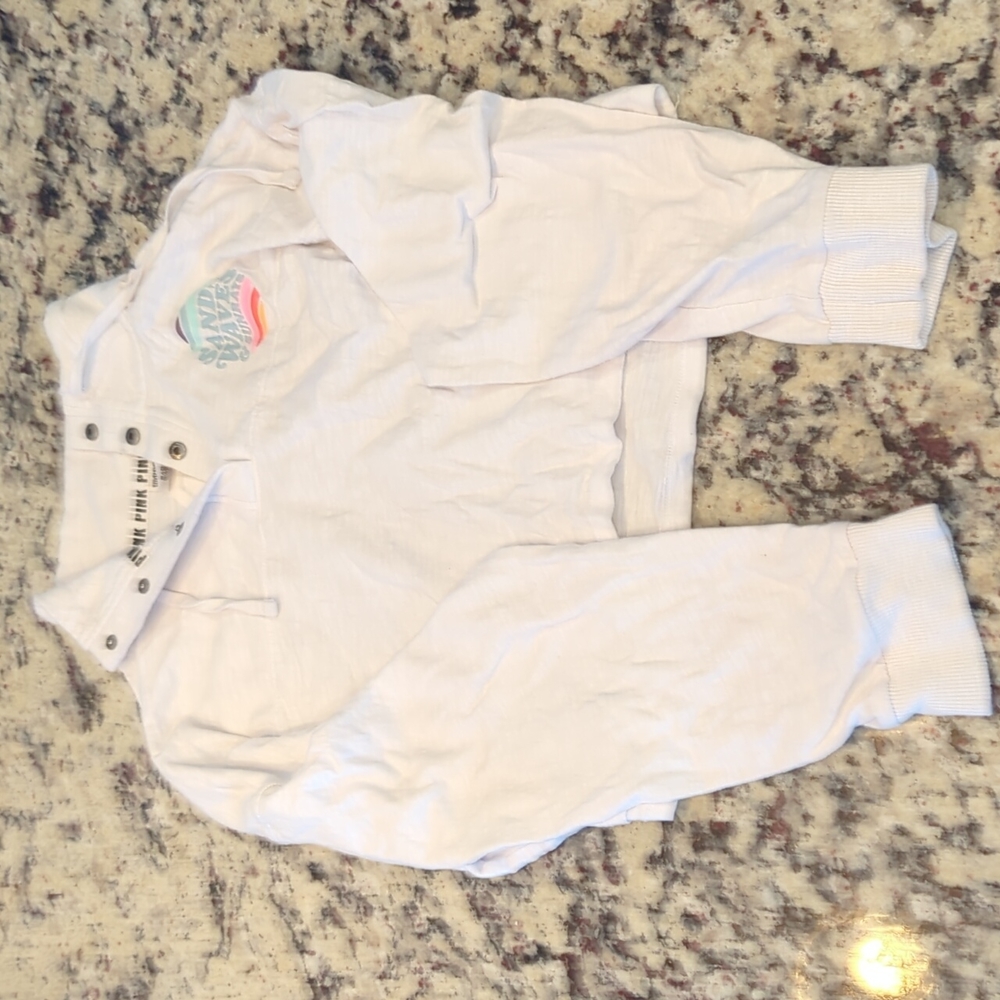 Pink crop long sleeve, Woman's, size medium, white with snaps at top of shirt